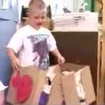 child with box