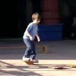 child on a balance toy